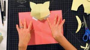 The tabs created above allow the card to close flat but to pop up when opened. How To Make A Kitten Head Pop Up Card Pop Up Cards Youtube