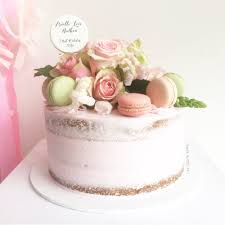 Cake with flowers and macarons. Arielle Semi Naked Cake Burnt Butter Cakes