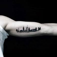 This minimalist design takes on the skyline of new york, sandwiched by heartbeat symbols. 70 City Skyline Tattoo Designs For Men Downtown Ink Ideas