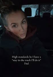 Loading Snowmobile with Skid Loader