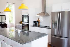 It makes the kitchen feel like a happy yet cool and relaxing place. Ikea Marsta Cabinets Hexagon White Tile Backsplash Quarts Countertop From Menards White Tile Backsplash White Tiles Tile Backsplash