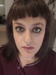 She looks better without the nose piercing