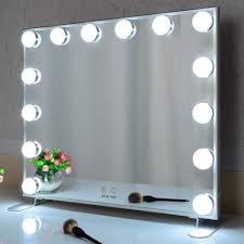 A lighted vanity mirror table is on every girl's wish list. Amazon Com Hollywood Vanity Mirror With Lights Lighted Makeup Mirror With 14pcs Dimmer Bulbs Dressing Table Mirror Wall Mounted Mirror Smart Touch Control Silver