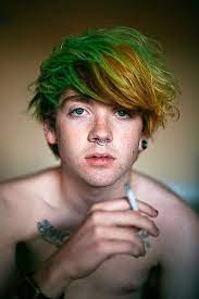 Green And Gold Side Swoop Piercings And Tattoo Add Dark Eye Make Up Emo Boy Look For The Anime Emo Punk Tech Move Men Hair Color Green Hair Green Hair Men