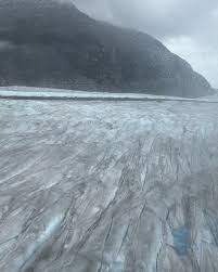 Helicoptering into a glacier.