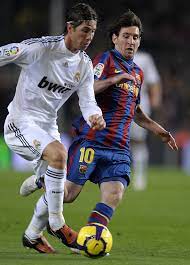Barcelona S Argentinian Forward Lionel Messi R Vies With Real Madrid S Defender Sergio Ramos L During Their Spanish Leagu Lionel Messi Messi Football Match