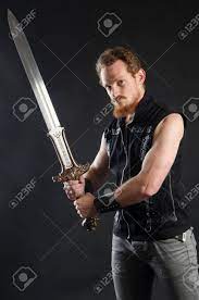 Holding two handed sword