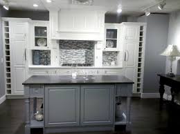 Dura Supreme Cabinetry Transitional Cottage Kitchen By Standale Interiors Island Wine Racks Kitchen Cabinets In Bathroom Cabin Color Scheme Cottage Kitchen