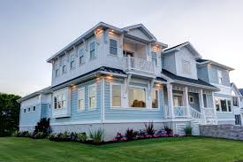 This white coastal cottage exterior makeover by the color concierge features traditional coastal paint colors. Light Blue Exterior Ideas Photos Houzz