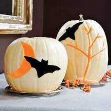 Punch holes in the top. Black Bats Painted On Pumpkins For Halloween Decorating In Black And Orange Colors Halloween Pumpkins Painted Halloween Decorations Halloween Party Scary
