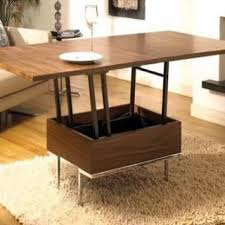 A compact coffee table that opens and converts into a large dining table. Fred Salles Spellweed Profile Pinterest