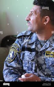 Talks to iraqi police hi-res stock photography and images