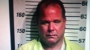 Longtime local banker choked, beaten to death; son charged