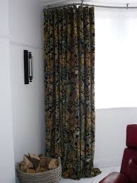 Full Length Curtains Dramatically Pooling Onto The Floor Bay Window Curtain Poles Bay Window Bay Window Curtains
