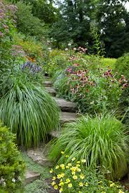 A Steeply Sloped Yard Becomes A Hillside Oasis This Old House Sloped Garden Sloped Yard Small Backyard Landscaping