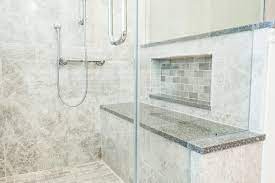 Consumer goods (sealing strips, magnets and drip rails) are covered by the with more than twenty five years of experience in production, we are the largest producer of bathroom equipment in central and eastern europe. Large Tiled Shower With Bench And Frameless Glass Shower Enclosure Transitional Bathroom Indianapolis By Case Design Remodeling Of Indianapolis Houzz