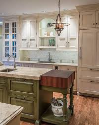 In this kitchen cozy atmosphere is created by using yellow, white and wood. Home Living Blog Green Kitchen Cabinets With Butcher Block Countertops