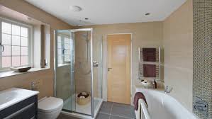 Guest bathroom with exposed brick wall. Budget Decorating Ideas For Your Guest Bathroom