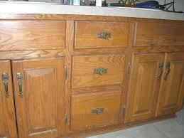 The same kitchen after cabinet refacing and remodeling. Oak Cabinets With A New Face Glazed Cabinets Are Beautiful