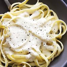 In A Medium Sauce Pan Melt Butter Over Medium Heat Stir In Garlic Powder Stir In Milk Greek Yogurt Alfredo Sauce Greek Yogurt Pasta Greek Yogurt Pasta Sauce