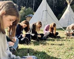Image of students participating in a camping trip