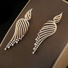 Earrings have always been one of the favorite ornaments of ladies. Tops Design Simple Dubai Gold Plated Jewelry Gold Earrings Women Buy At The Price Of 25 85 In Alibaba Com Imall Com