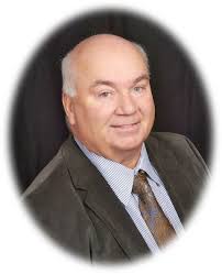 James W. Becker, D.D.S.