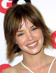 This curly shag cut from rihanna has just the right amount of feathery texture in the bangs, making it retro inspired but still somehow completely modern. 30 Gorgeous Feathered Short Hairstyles For Women Hairdo Hairstyle