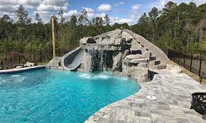 Rico rock now offers a new water fountain composed of eight modular pieces to create an esthetically pleasing poolside rock waterfall. Jacksonville Pool Waterfall Design Beautiful Custom Waterfalls For Your Pool Deck