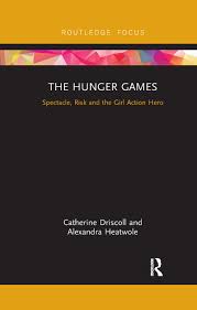 Litcharts assigns a color and icon to each theme in catching fire, which you can use to track the themes throughout the work. The Hunger Games Spectacle Risk And The Girl Action Hero 1st Editi