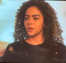 Can anyone help me find Ginny's distressed black sweater from season 2  episode 7 of Ginny and Georgia? Added a few more pictures but they aren't  great!