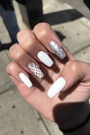 Acrylic nails are especially for people who feel like their nails never grow. White And Silver Nails With Design Gel Polish Glitter Coffin Shape Nail Art Acrylic White And Silver Nails Silver Nail Designs White Nail Designs