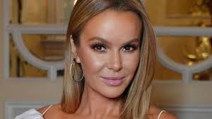 BGT judge Amanda Holden's fans spot fashion mishap with corset thigh-split  dress