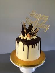 Tiramisu Cake Vanilla Sponge Layers Drizzled With Rum And Espresso Syrup Mascarpone Buttercream Filling Whi Chocolate Cake Cookies Drip Cakes Tiramisu Cake
