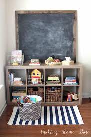 How To Manage Toy Organization When You Don T Have A Playroom Kid Friendly Living Room Kids Room Organization Living Room Toy Storage
