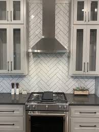 Handmade and polished, our white ceramic tile backsplash will look amazing in any room. Double Herringbone Subway Tile In 2021 Patterned Kitchen Tiles Herringbone Backsplash Kitchen Herringbone Tile Kitchen