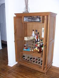 The best approach to equipping your mini liquor cabinet is following the principle that less is more. Diy Liquor Cabinet Made Armoire Decofurnish Decoratorist 53772