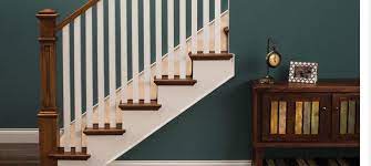 Removing the existing paint from a wooden banister is a necessary step before you refinish it. Stairs Railings