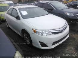 Toyota emphasizes overall value for the 2014 camry while trying to entice buyers to move beyond the lower trim levels. 2014 Toyota Camry 2014 White 2 5l Vin 4t1bd1fk0eu099183 Free Car History