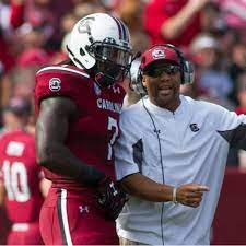 University Of South Carolina Defensive Line Coach Deke Adams With Jadaveon Clowney Football Helmets Sport Fitness University Of South Carolina