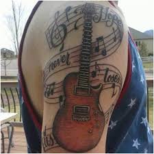 A sticker pack which includes the musical symbols of a treble clef, bass clef. 45 Guitar Tattoo Designs And Ideas Tattoos Era