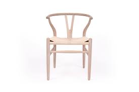 The chair also comes in with arms design with a twistable seat with solid looking steel legs. Wishbone Designer Replica Chair White Coastal Oak Abide Interiors