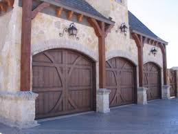 Avoid the stress of doing it yourself. Wood Garage Doors Lovetoknow