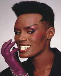 Singer Actress And Model Grace Jones Is Beloved For Her Outlandish Style Wild Personality And Her Sharply Angl Grace Jones African American Hairstyles Women