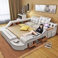 When designing your video game room, consider incorporating a seating area so you'll have a space to entertain friends. Bed Surround Set Up Stay In Bed With This Cool Piece Of Furniture Bed Design Modern Bedroom Bed Design Bed Furniture Design