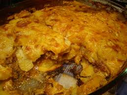 Asezati un strat de cartofi. Musaca De Cartofi Cu CrustÄƒ De Sos Bechamel FetiÅ£ele Minunate