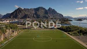 It has got no stands—just a couple of meters of asphalt poured around the field—and is used only for. Norway Lofoten Football Field Stadium In Stock Video Pond5