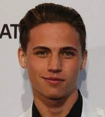 He is best known for his roles as leo kirkman in the abc political drama designated survivor and robby keene in the netflix series cobra kai.he is also known for his role in the nickelodeon television series game shakers as mason kendall. Tanner Buchanan Biography Career Age Net Worth Image