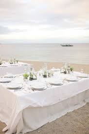 Crisp Whites And Fun Nights Beach Wedding Table Settings Wedding Table Setup Beach Wedding Tables