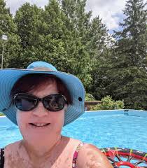 Enjoying 88-degree Wisconsin pool night with kids